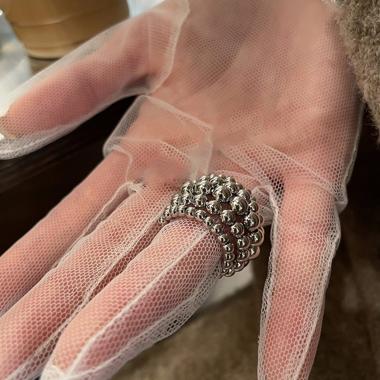 Multi-layered round bead open ring