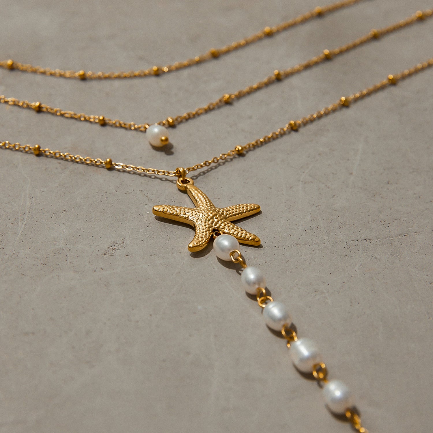 Stainless steel freshwater pearl starfish necklace
