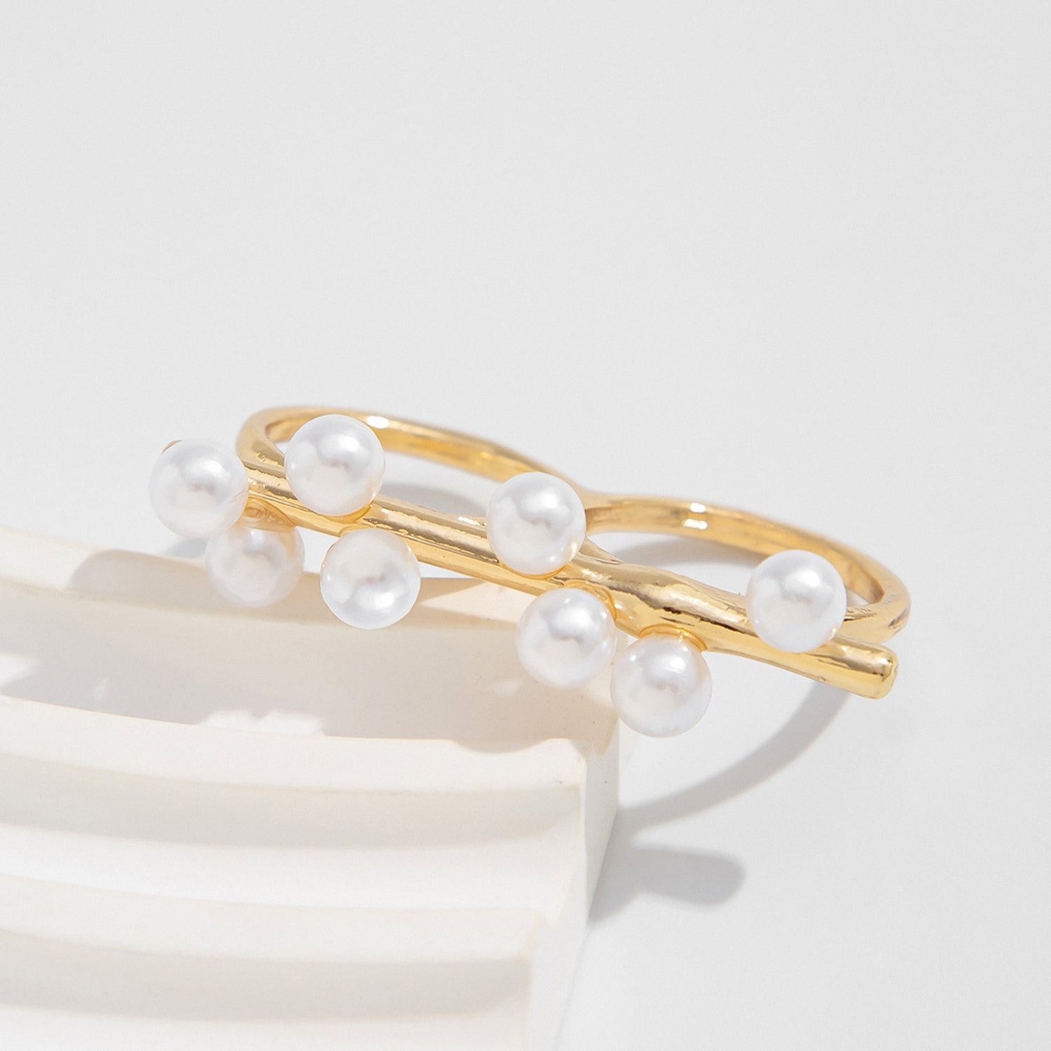 One single-line pearl double-finger ring