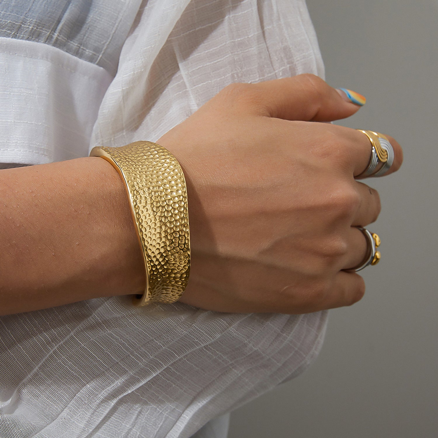 Wide stainless steel hammer-patterned open bracelet