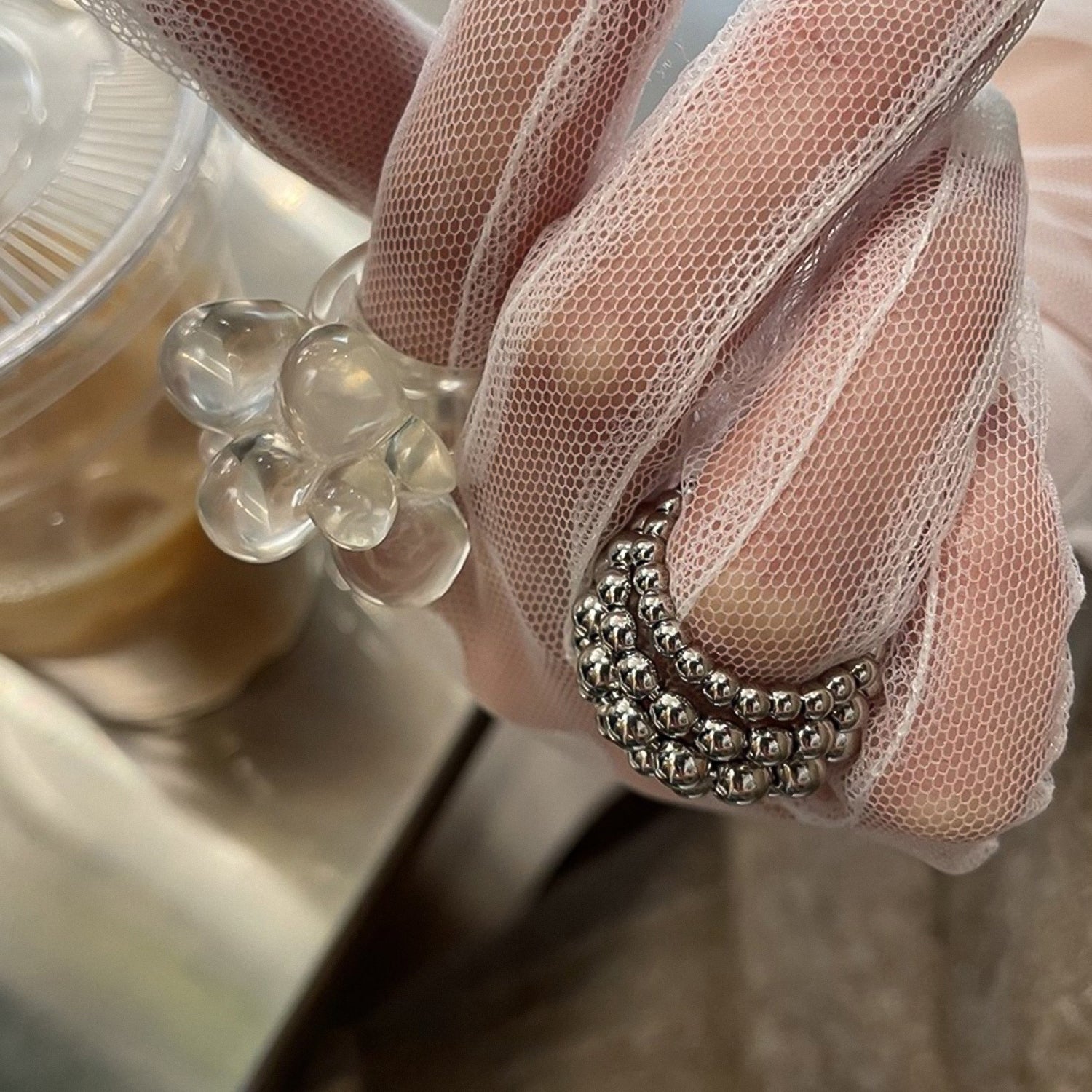 Multi-layered round bead open ring